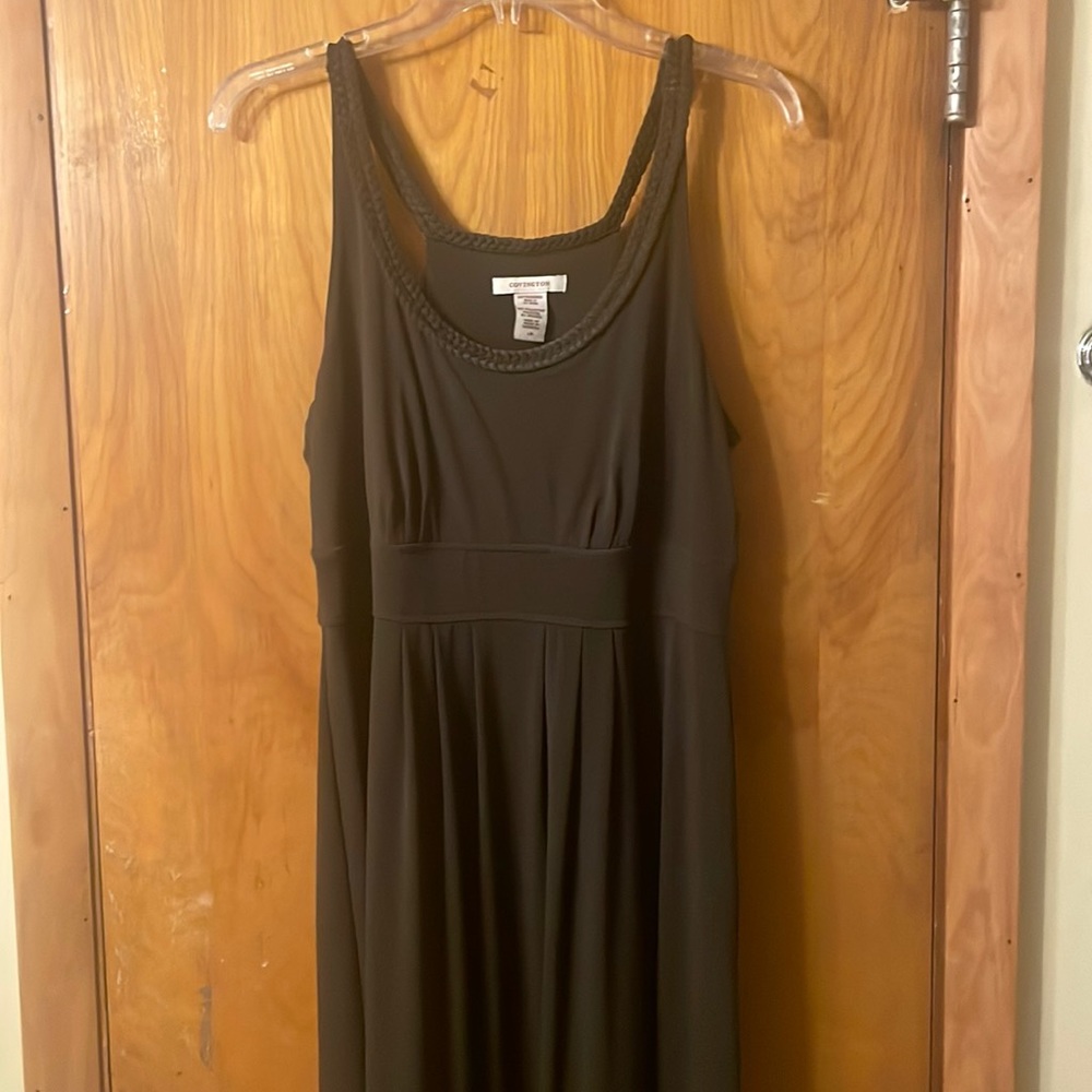 Brown sleeveless form fitting dress.